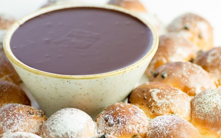 Tear and share dough balls with dark chocolate sauce