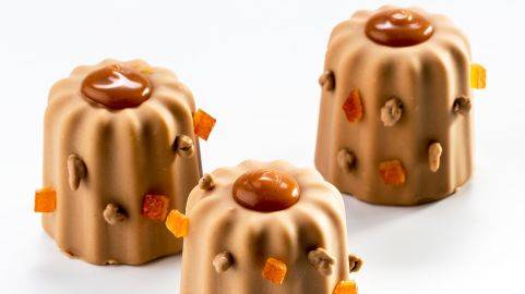 Canelés de avellana, naranja y malta